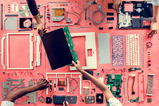 Tech laid out and taken apart for server recycling